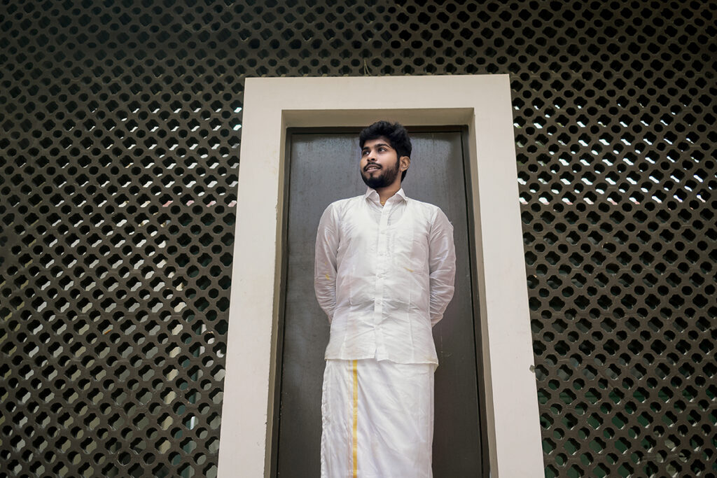 indian groom poses photography