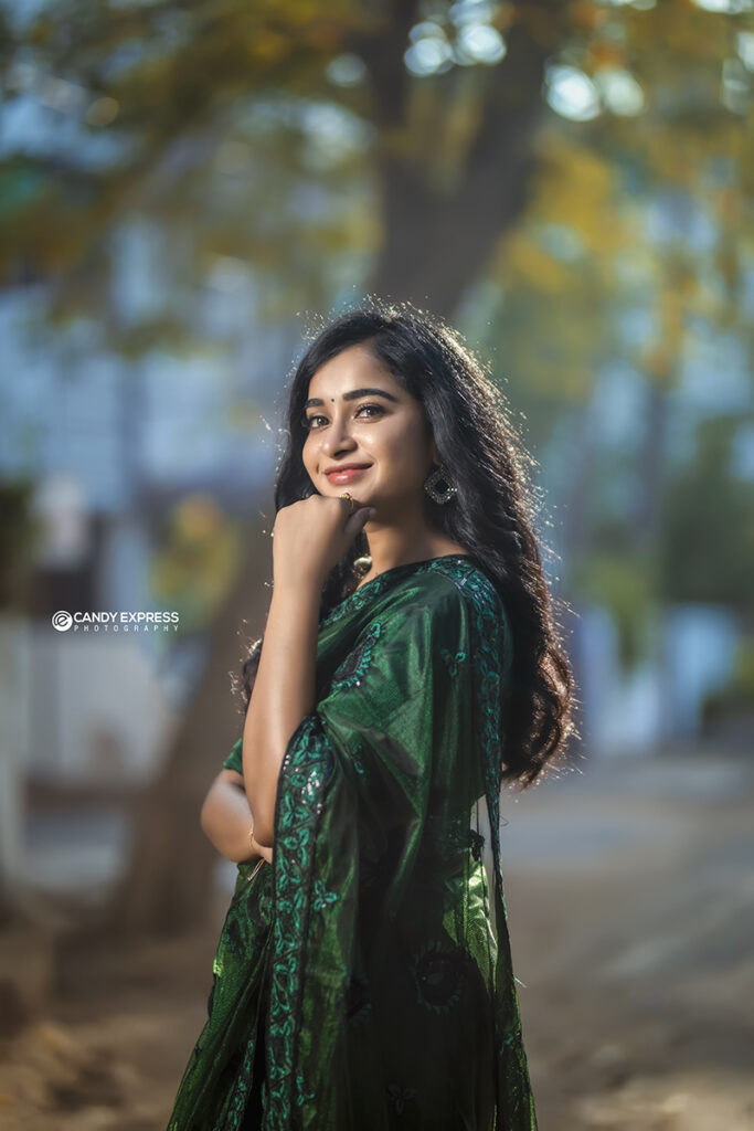 model poses female in saree